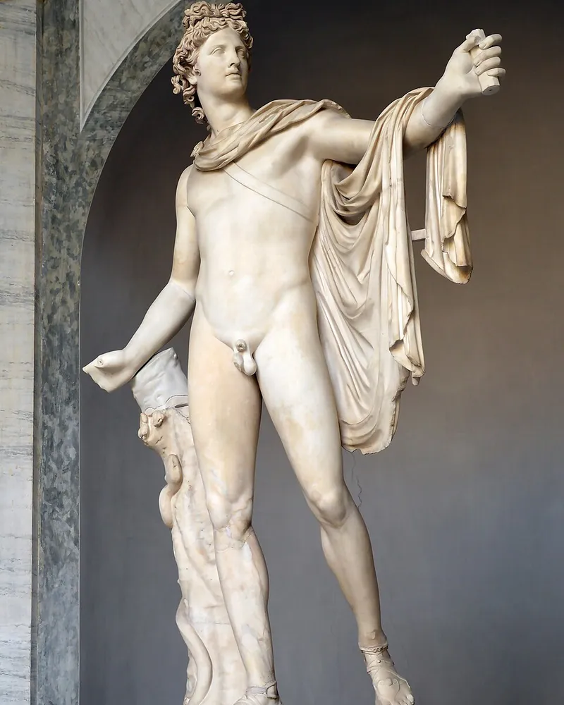Marble statue of Apollo with a cloak over his outstretched arm, the Apollo Belvedere.